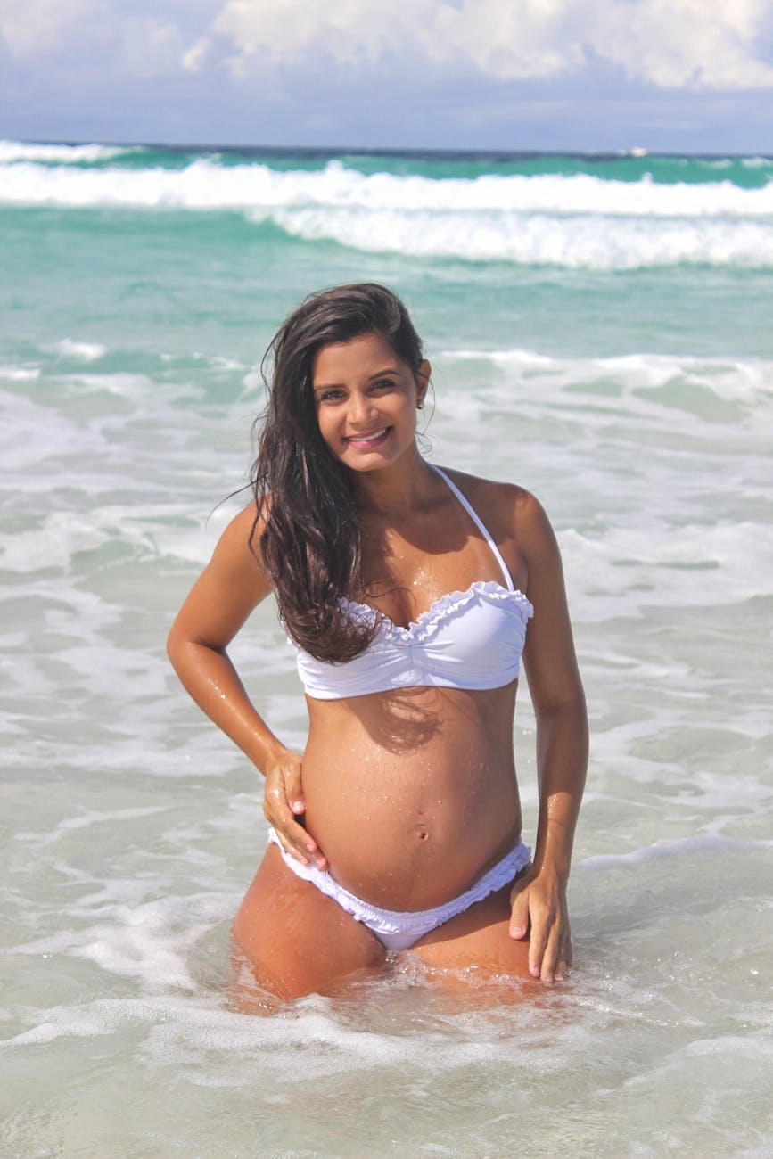 Vanessa Hudgens Stuns Fans with Joyful Baby Bump Reveal in Iconic Beachwear